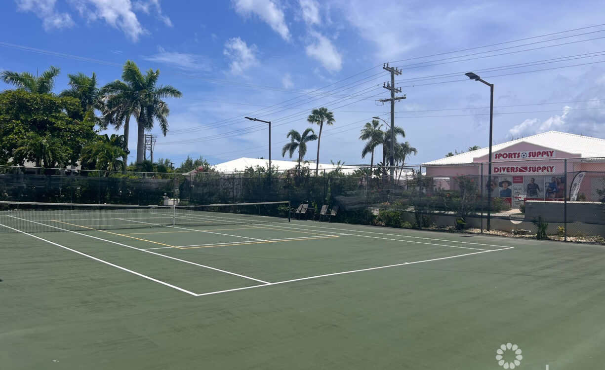 CAYMAN REEF RESORT BEACHFRONT WITH FUTURE REDEVELOPMENT