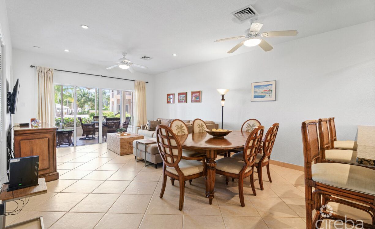 open concept kitchen bar, dining area and living room