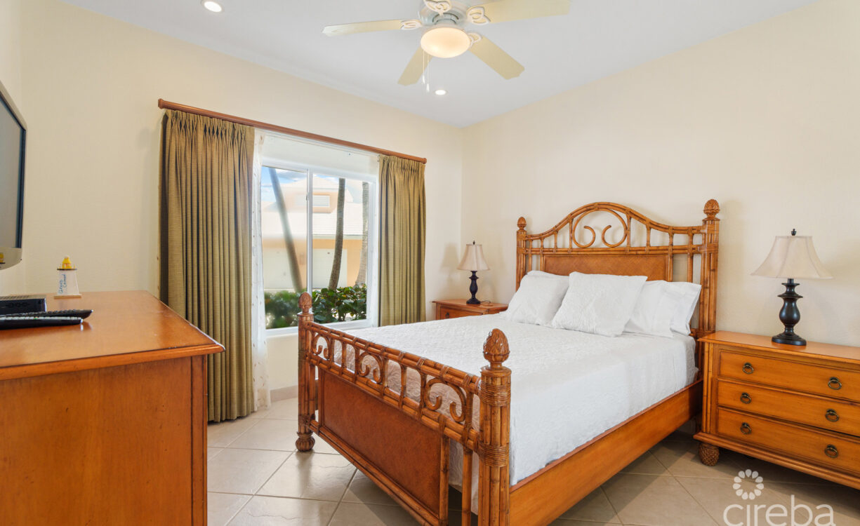Spacious second bedroom with queen Tommy Bahama bedroom suite