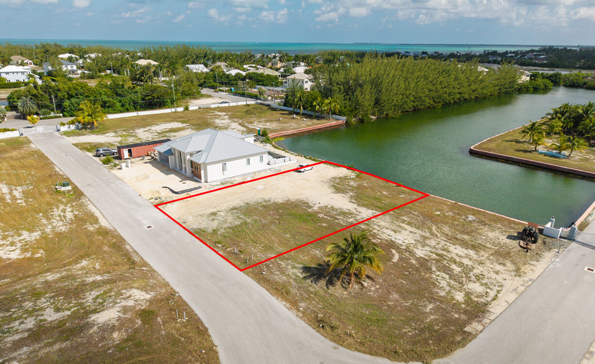 0.24 ACRE CANAL LOT IN GATED COMMUNITY - MUSTIQUE COVE