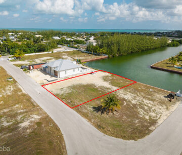 0.24 ACRE CANAL LOT IN GATED COMMUNITY - MUSTIQUE COVE