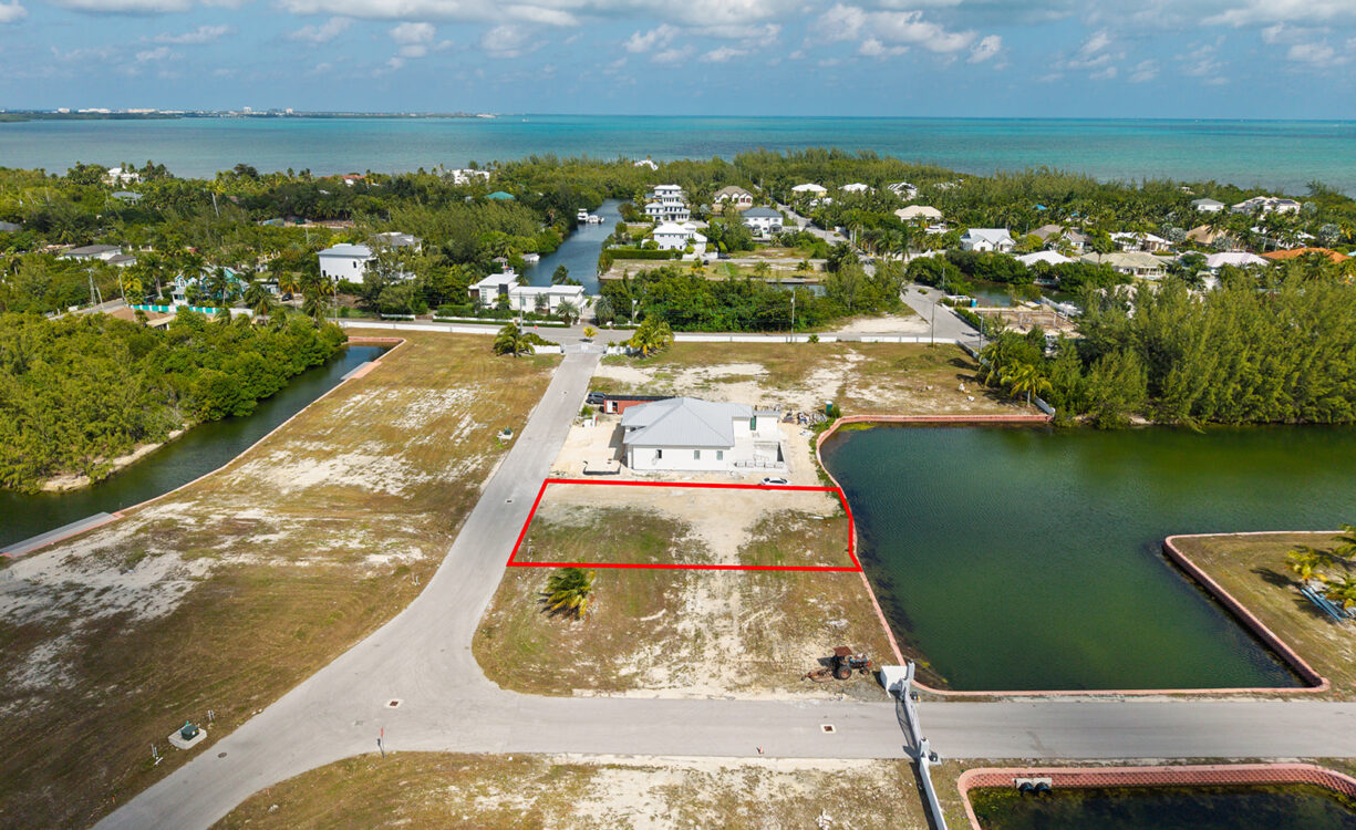 0.24 ACRE CANAL LOT IN GATED COMMUNITY - MUSTIQUE COVE