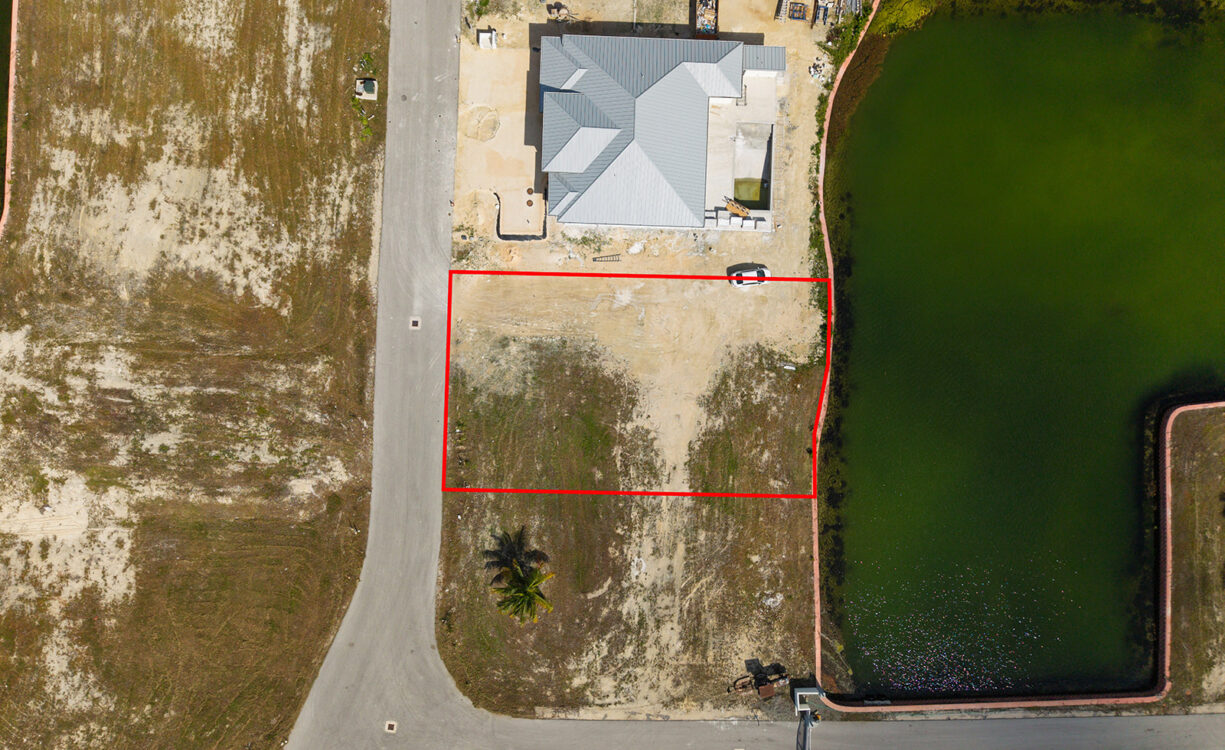 0.24 ACRE CANAL LOT IN GATED COMMUNITY - MUSTIQUE COVE