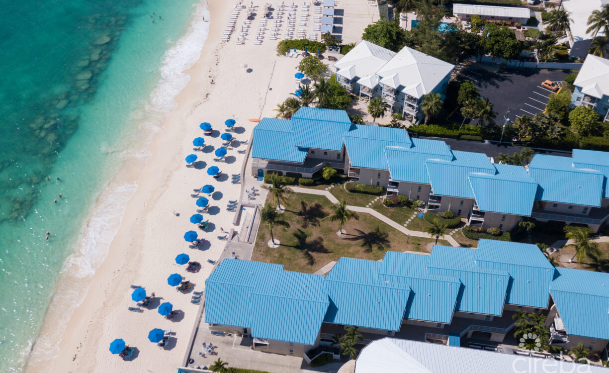 CAYMAN REEF RESORT BEACHFRONT WITH FUTURE REDEVELOPMENT