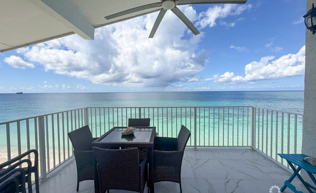 CAYMAN REEF RESORT BEACHFRONT WITH FUTURE REDEVELOPMENT