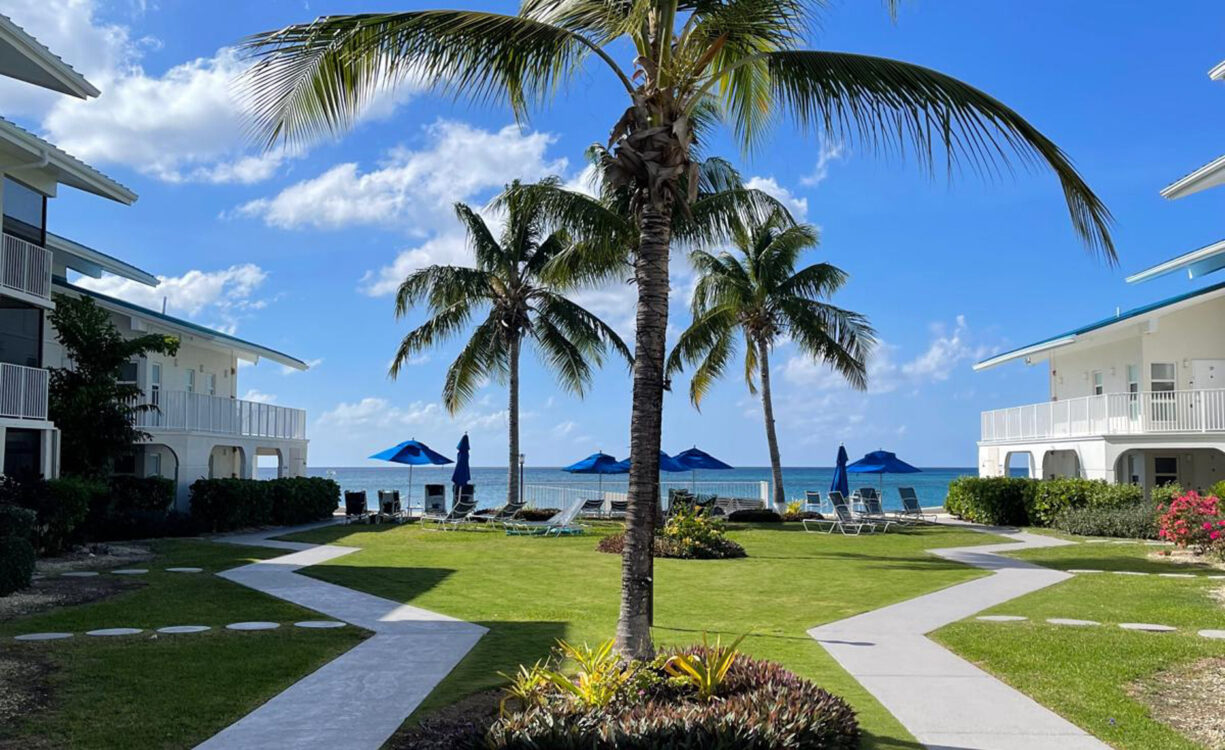 CAYMAN REEF RESORT BEACHFRONT WITH FUTURE REDEVELOPMENT