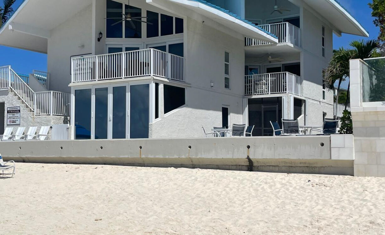 CAYMAN REEF RESORT BEACHFRONT WITH FUTURE REDEVELOPMENT
