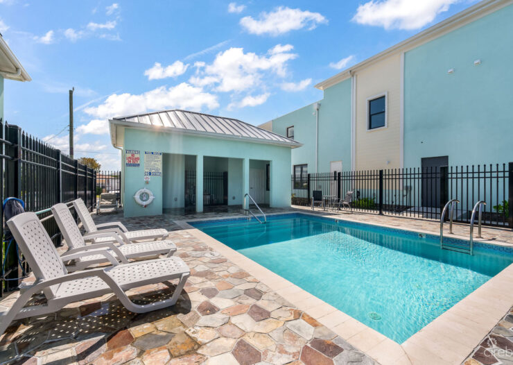 INCOME-PRODUCING RESIDENTIAL PORTFOLIO --4 STUDIOS IN WEST BAY
