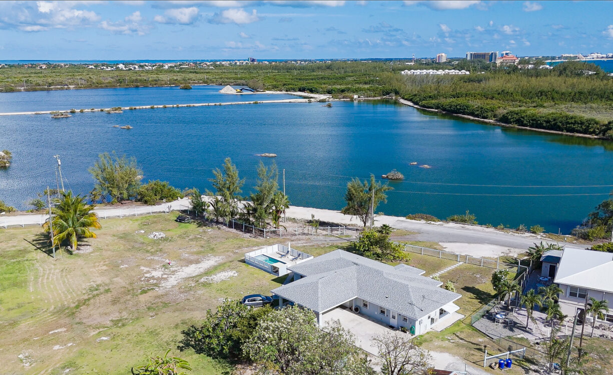 DEVELOPMENT LAND WITH RENTAL INCOME JUST OFF SMB CORRIDOR