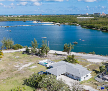 DEVELOPMENT LAND WITH RENTAL INCOME JUST OFF SMB CORRIDOR