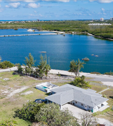 DEVELOPMENT LAND WITH RENTAL INCOME JUST OFF SMB CORRIDOR