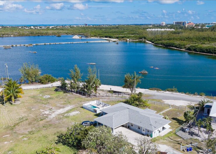 DEVELOPMENT LAND WITH RENTAL INCOME JUST OFF SMB CORRIDOR