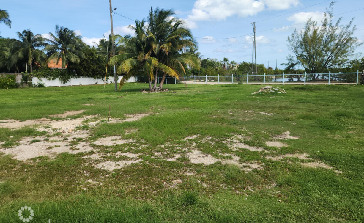 DEVELOPMENT LAND WITH RENTAL INCOME JUST OFF SMB CORRIDOR