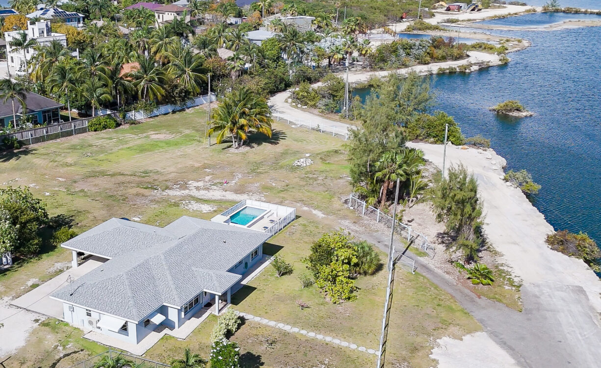 DEVELOPMENT LAND WITH RENTAL INCOME JUST OFF SMB CORRIDOR