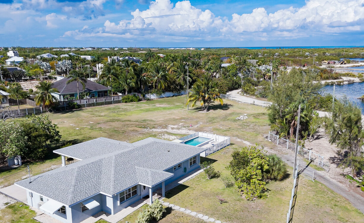 DEVELOPMENT LAND WITH RENTAL INCOME JUST OFF SMB CORRIDOR